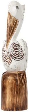Глобус увезува врежана дрвена фигура на пеликан